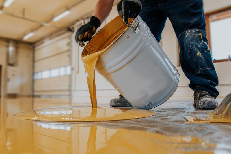pouring concrete mixture on the floor